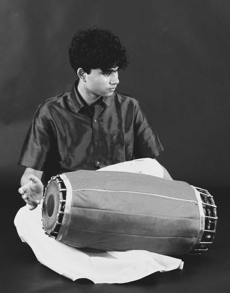 Akshay playing mridangam